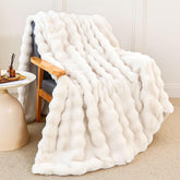 Admitrack throw front view showing cream white bubble texture and cozy appeal