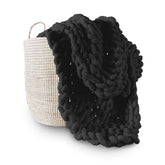 Adyrescia front view of Raven Black throw showing neat hand-knit finish and cozy look