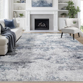 Aelenmu front view of 9x12 rug showing blue grey abstract pattern and scale
