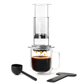 AeroPress Clear front view showing the full brewer and clear Tritan for visibility and durability