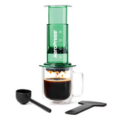 AeroPress clear green front view showing compact design and quick brewing benefit