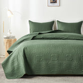 akkialla front view of olive green king quilt showing full bed coverage and modern style
