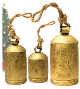 ALADEAN front view of three rustic golden cow bells on jute rope showing vintage charm