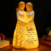 AlevaHive front view of resin sister figurine showing silhouette and engraving, meaningful decor
