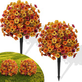 Alupssuc front view of two fall topiary balls adding instant curb appeal