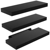 AMADA HOMEFURNISHING front view of three matte black floating shelves showing clean modern lines and storage benefit