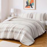 Amazon Basics front view of beige queen comforter set showing neat striped design and cozy look