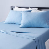 Amazon Basics king sheet set front packaging showing sky blue color and included pieces