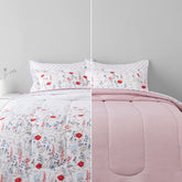 Amazon Basics front view of pink floral comforter set showing coordinated pieces and fast setup
