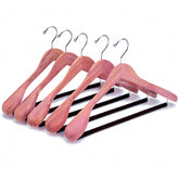 Amber Home front view of 5-pack cedar hangers showing neat, durable storage benefits