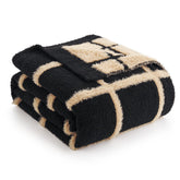 Amélie Home folded throw front view shows cozy softness and instant living-room upgrade