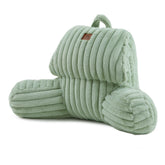 Amélie Home front view of sage green reading pillow showing ergonomic shape and comfort