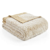 Amélie Home front packaging showing heather beige throw and gift-ready look