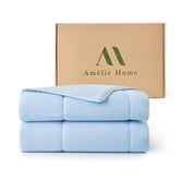 Amélie Home front view of heather ice blue comforter showing cool finish benefit
