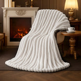 Amélie Home folded throw front view showing ivory elegance and cozy appeal