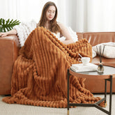 Amélie Home front view showing plush orange brown throw and cozy look