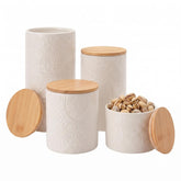 American Atelier front view of four canisters showing cohesive kitchen storage and style