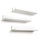 Americanflat front view of three white floating shelves showing clean modern storage