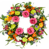 AMF0RESJ peony wreath on front door adding cheerful curb appeal