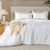 Andency comforter front view showing crisp white finish and clean lines for a polished bed