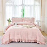 ANGIYUIN front view of blush pink ruffle comforter showing cozy design