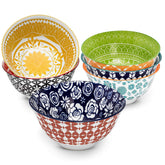 Annovero front view of six-bowl set showing colorful patterns and vibrant table impact