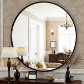 Antok 24-inch round mirror front view showing clear reflection and style