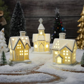 AOMOONOA front group view showing three houses glowing for cozy ambiance