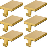 ARCHCRTC front view of two gold stocking holders showing neat placement and stability