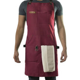 Asaya apron front view showing pockets and durable canvas for organized cooking
