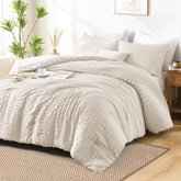 AveLom front view showing beige seersucker comforter for a polished bed