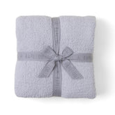 Barefoot Dreams CozyChic throw front view showing soft oyster color and elegant drape