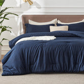 Bedsure navy comforter front view showing full bed coverage and cozy look