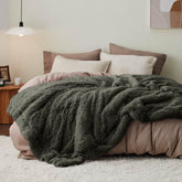 Bedsure olive green blanket front spread showing full coverage and cozy look