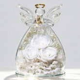 Beferr front view of glass angel figurine showing elegant preserved rose and base benefit display