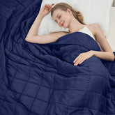 BETU front view of navy weighted blanket showing size and neat fold, highlights comfort