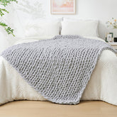 Bigacogo front view of light grey chunky knit throw, adds cozy style