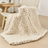 Bigacogo front view of beige chunky knit throw showing neutral decor appeal and cozy look