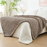 Bigacogo taupe throw front folded on couch showing neutral style and cozy accent