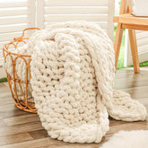 Bigacogo throw front view folded on couch showing neutral beige comfort