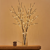 Birchlitland front view of branches showing full arrangement and warm glow