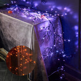 Birchlitland front view of garland packaging showing orange and purple LEDs benefit party setup