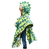 birdyboutique front view of green dinosaur poncho shows full coverage and easy fit