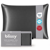 Blissy silk pillowcase front view showing smooth gray surface and refined finish