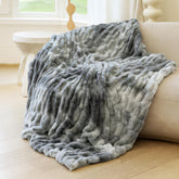 blunique front view of tie-dye gray throw showcasing style and cozy look