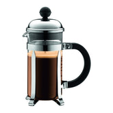 Bodum Chambord front view showing polished frame and glass carafe for durable style
