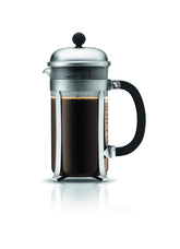 Bodum Chambord front view showing polished stainless frame and glass carafe, elegant countertop benefit
