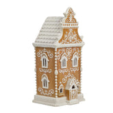 Braxio gingerbread house front view showing festive LED glow and cozy design benefit