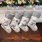 BSTAOFY front view of four silver stockings showing variety and festive appeal