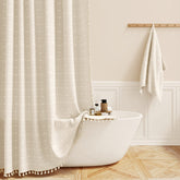 BTTN front view cream beige shower curtain showing textured drape and style